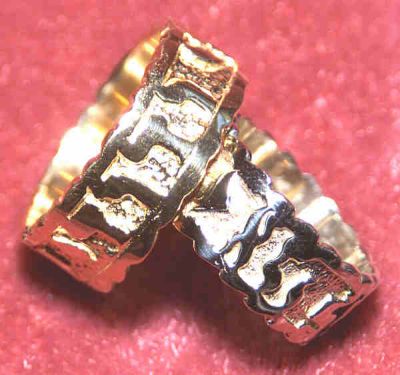 weddingringsjpg MEN 39s Ani L 39Dodi Wedding bands have a thicker band of gold